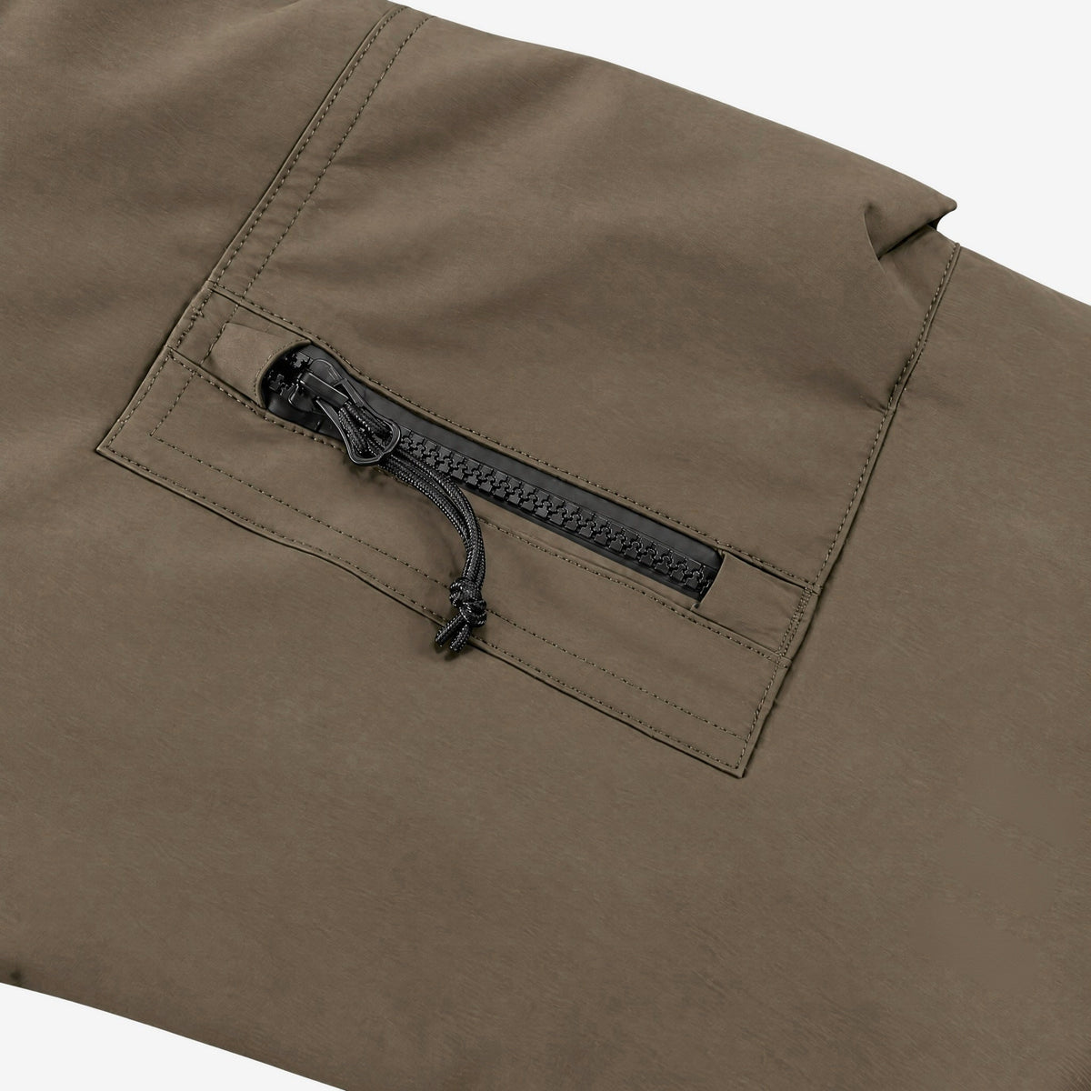 Endeavor 2L Bomber Jacket in Algae, zip pocket on the left upper sleeve