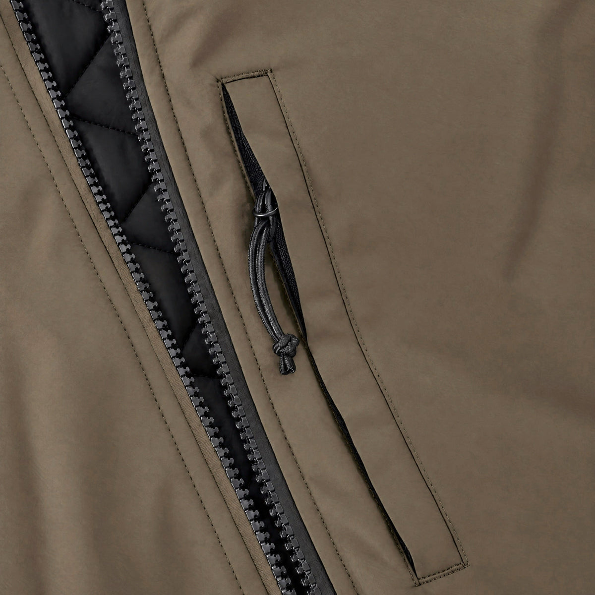 Endeavor 2L Bomber Jacket in Algae, vertical zip chest pocket beside the two-way front zip