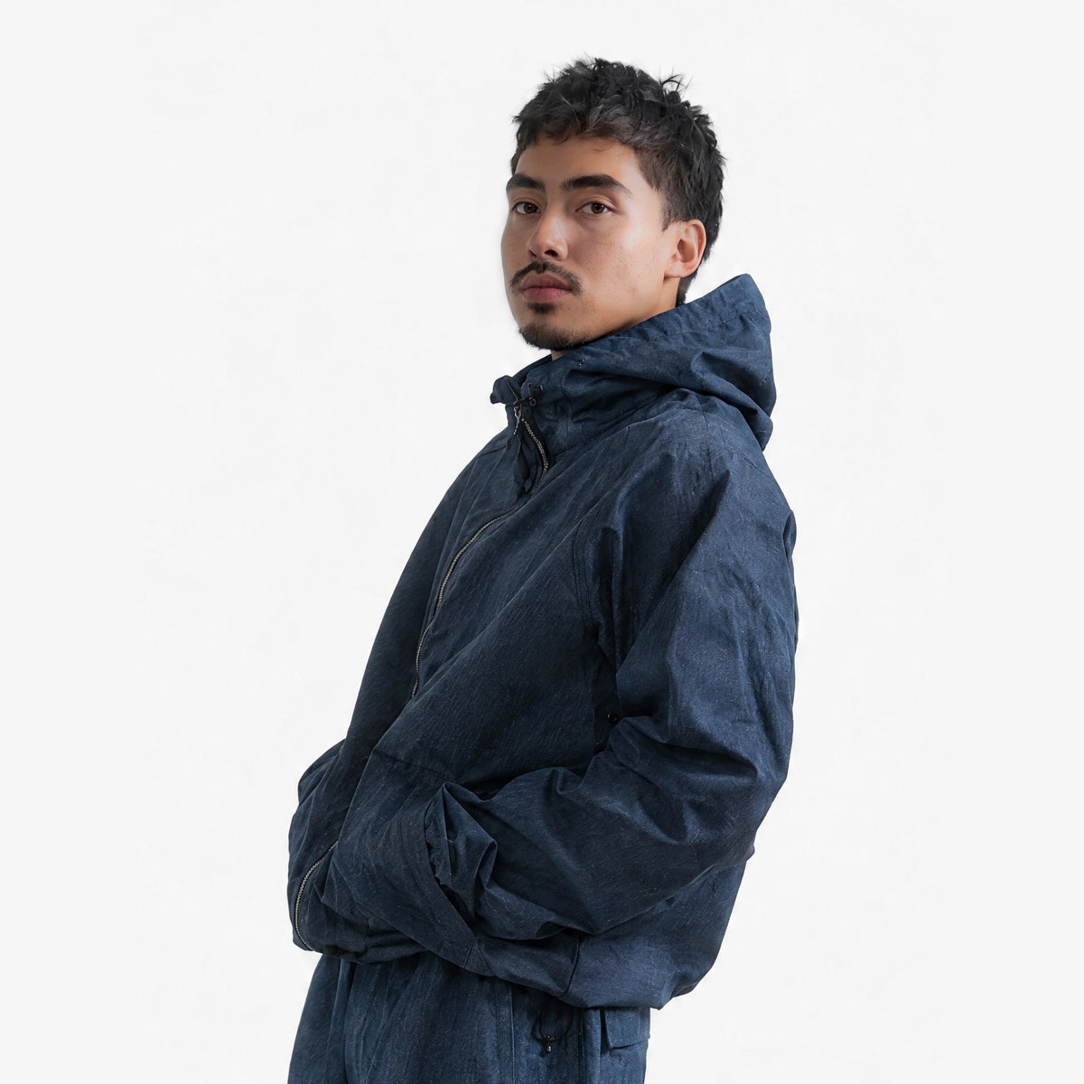 Endeavor 20K Windbreaker Limited Edition in Raw Denim, on model, waist-up