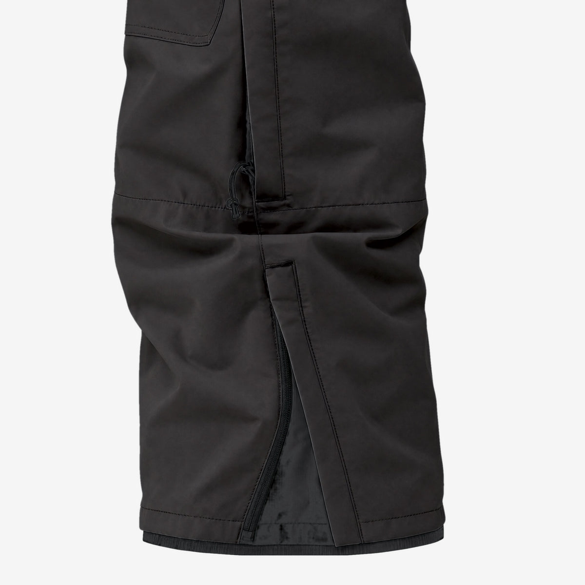 Endeavor 3L Elite Pant Black, boot cut hem detail