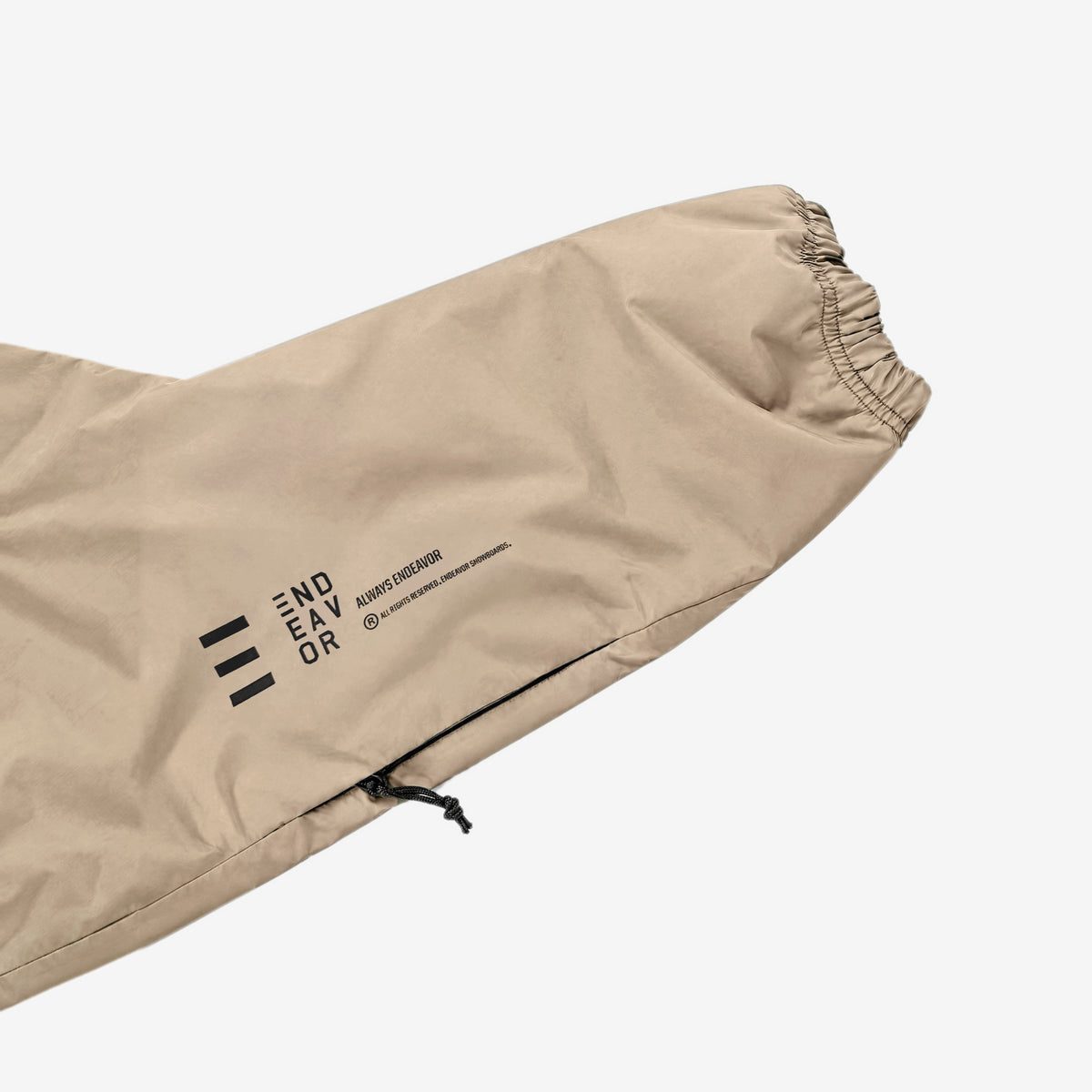 Endeavor 20K Windbreaker in Fiber, forearm print END/EAV/OR with ALWAYS ENDEAVOR and arm-pocket zip