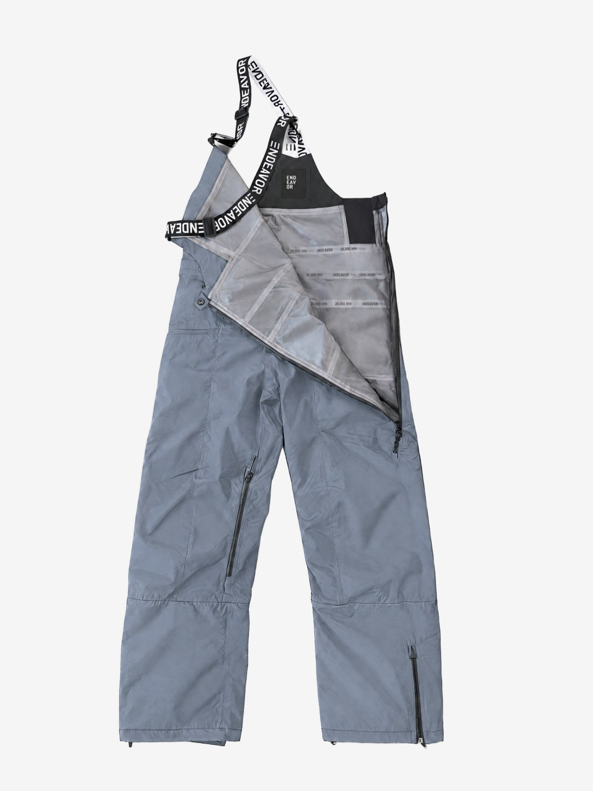 Endeavor 3L Shelter Bib Pant Graphite, side zip opened to show the taped 3-layer lining and inner label