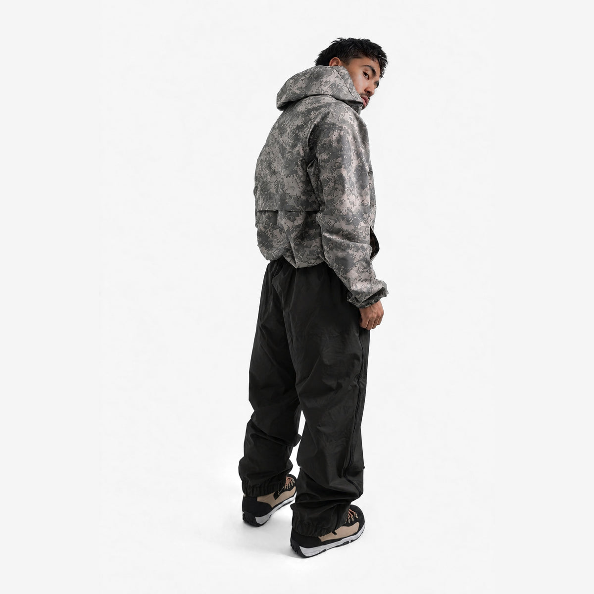 Endeavor 3L Scout Park Pant in Black, on model, another angle