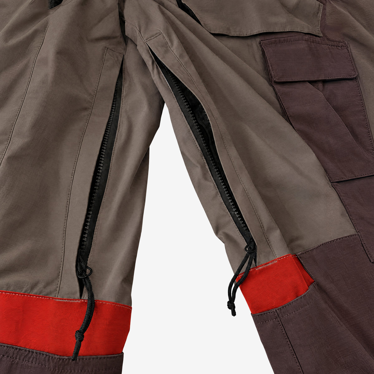 Endeavor 2L Patrol Cargo Pant in Chocolate / Silt, inner leg vents unzipped to the mesh lining, with the knee tabs