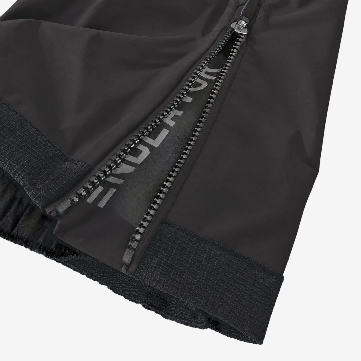 Endeavor 3L Shelter Bib Pant Black, boot zip hem detail