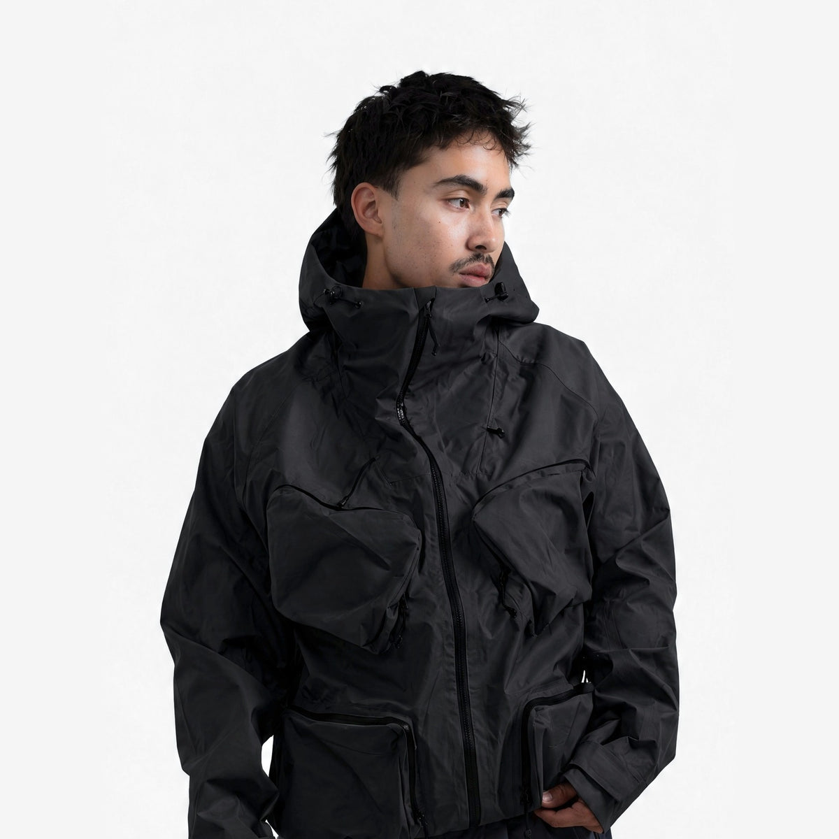 Endeavor 3L Bellow Jacket in Black, on model, waist-up