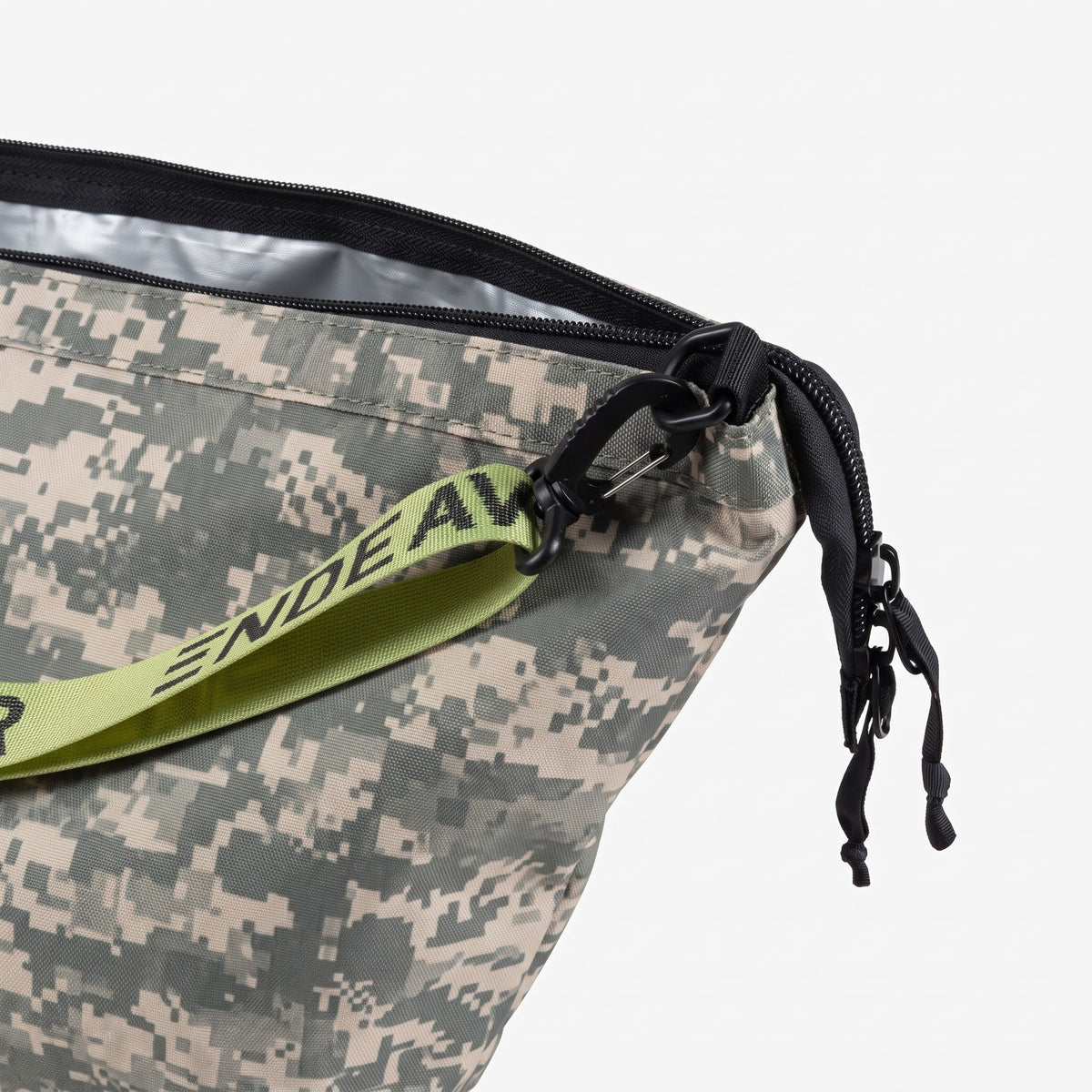 Endeavor Surplus Gear Bag in Digi Camo, close-up of the zip corner and shoulder strap clip