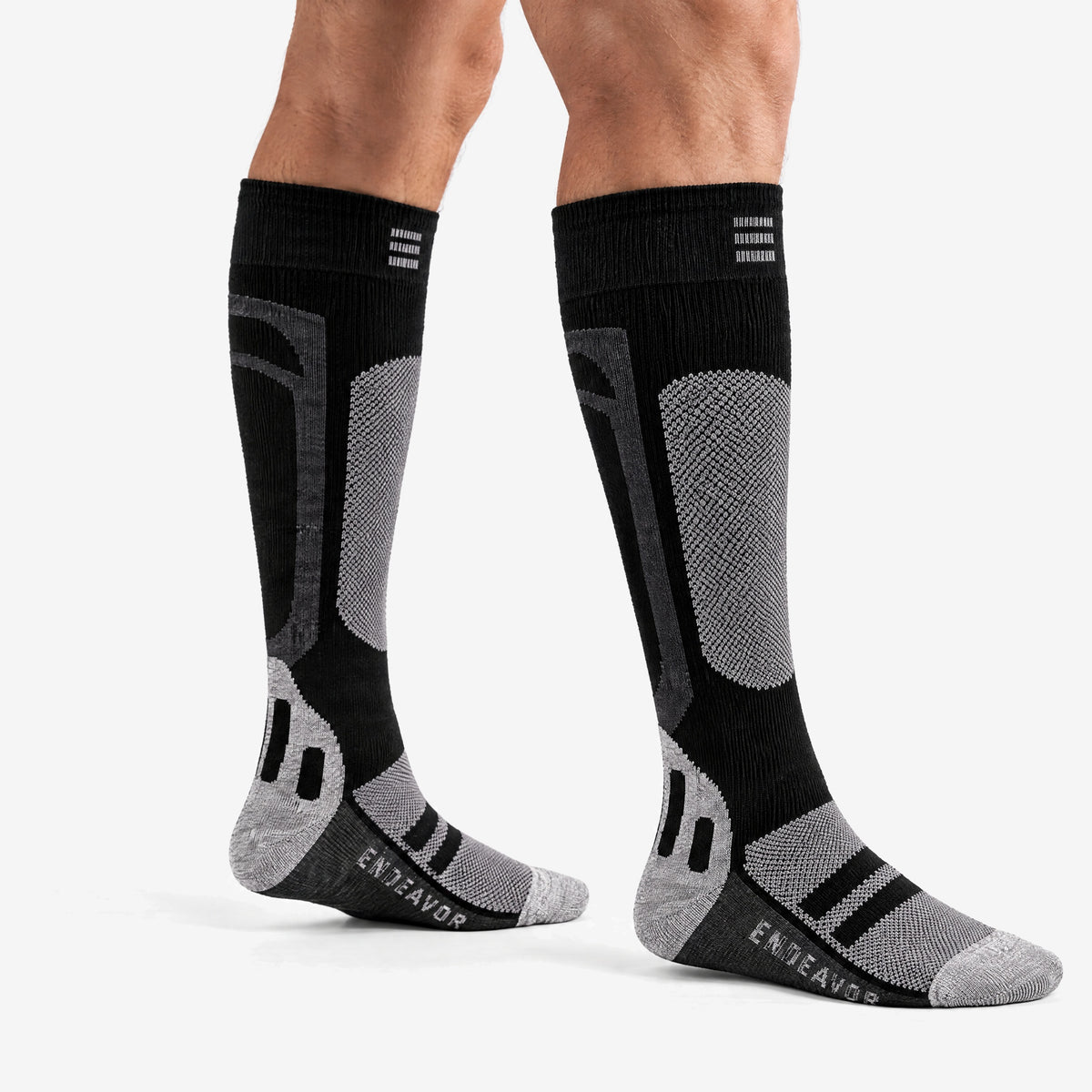 Endeavor Surplus Sock in black, worn, three-quarter side view
