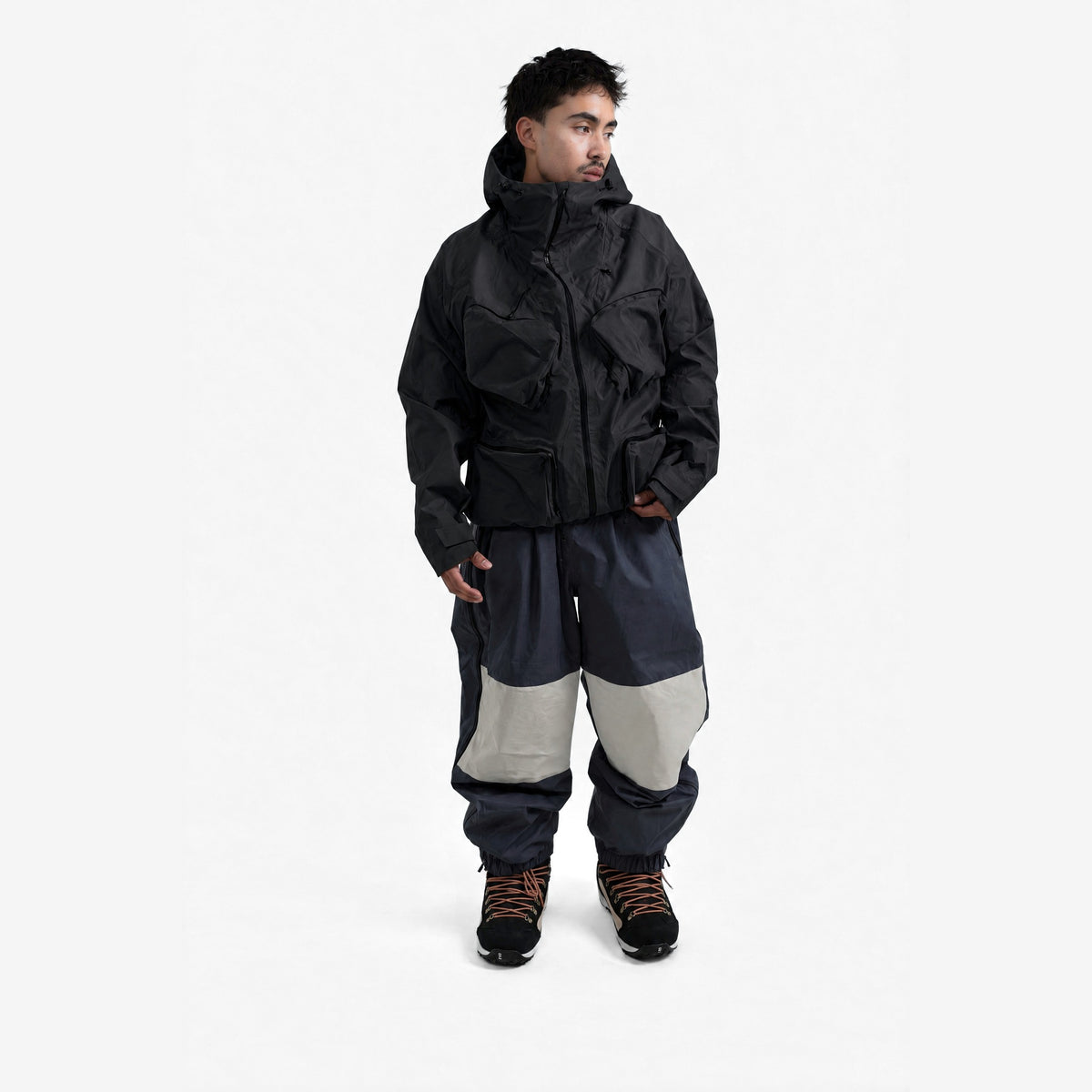 Endeavor 3L Bellow Jacket in Black, on model, another angle