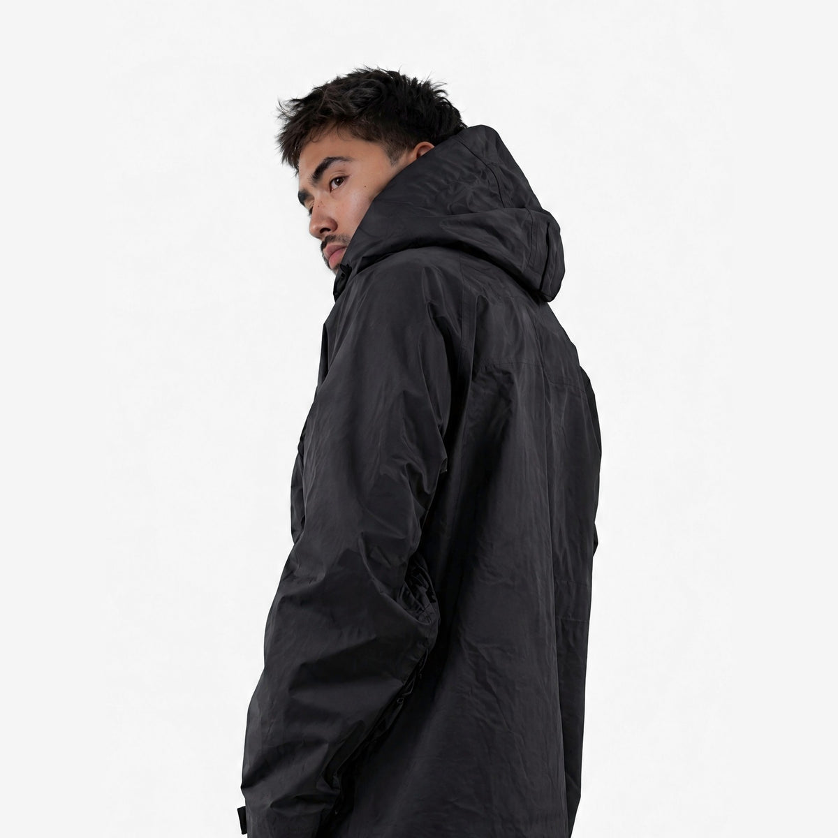 Endeavor 3L Bellow Jacket in Black, on model, waist-up