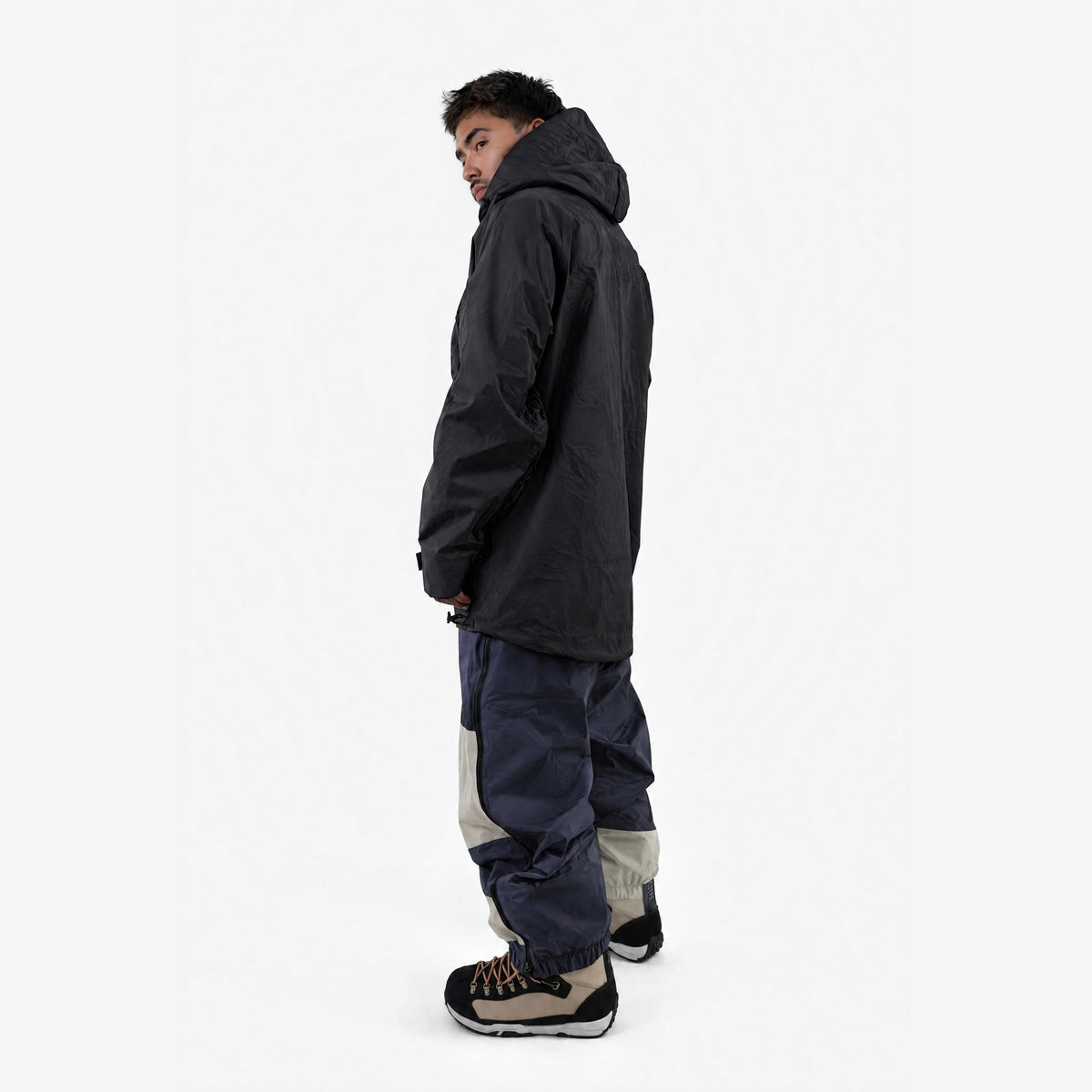 Endeavor 3L Bellow Jacket in Black, on model, another angle