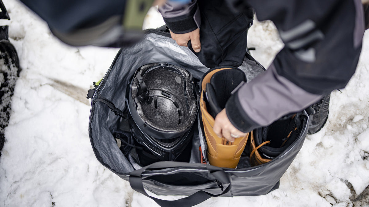Endeavor Surplus Gear Bag packed with boots and a helmet, kept separate