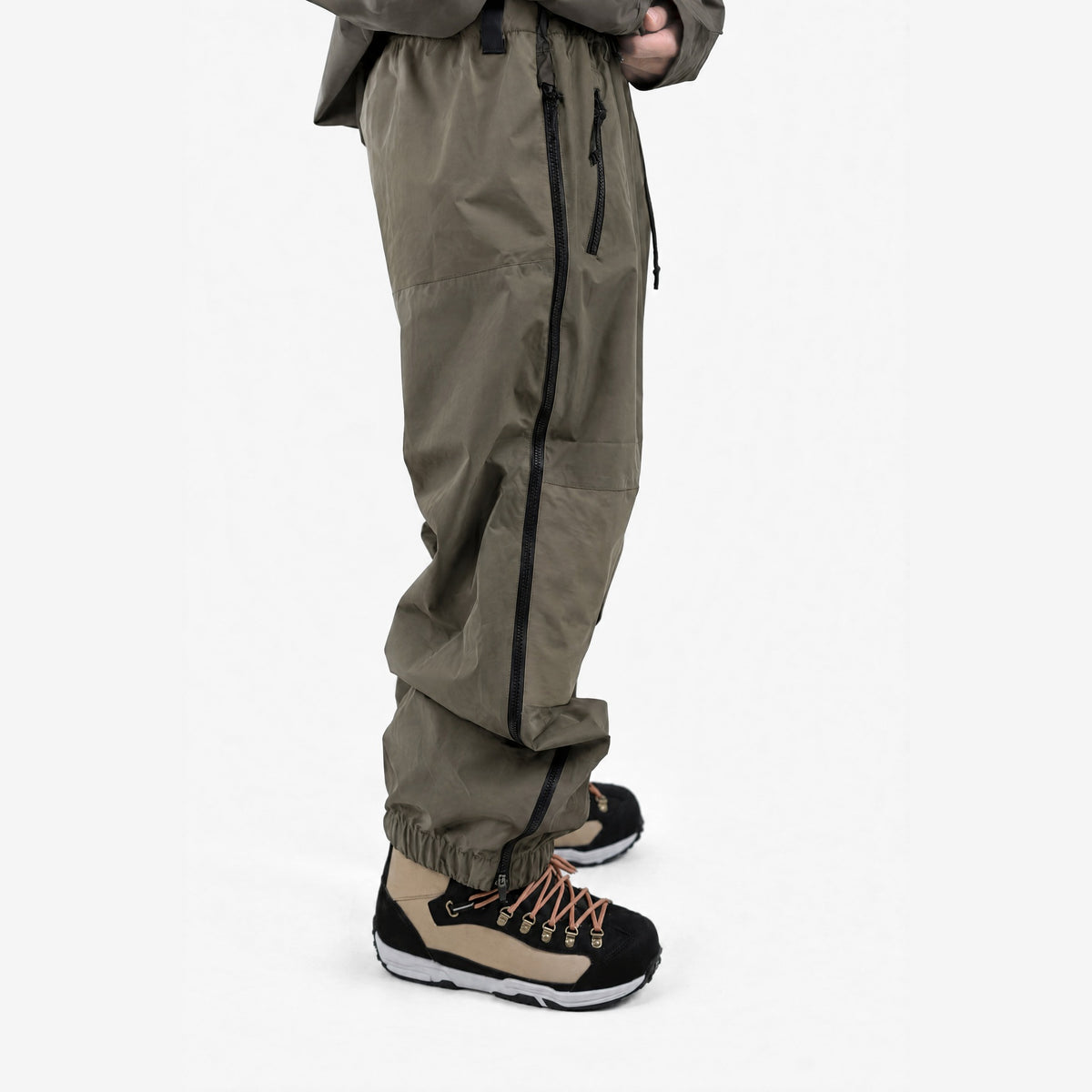 Endeavor 2L Ranger Pant in Algae, on model, leg close-up