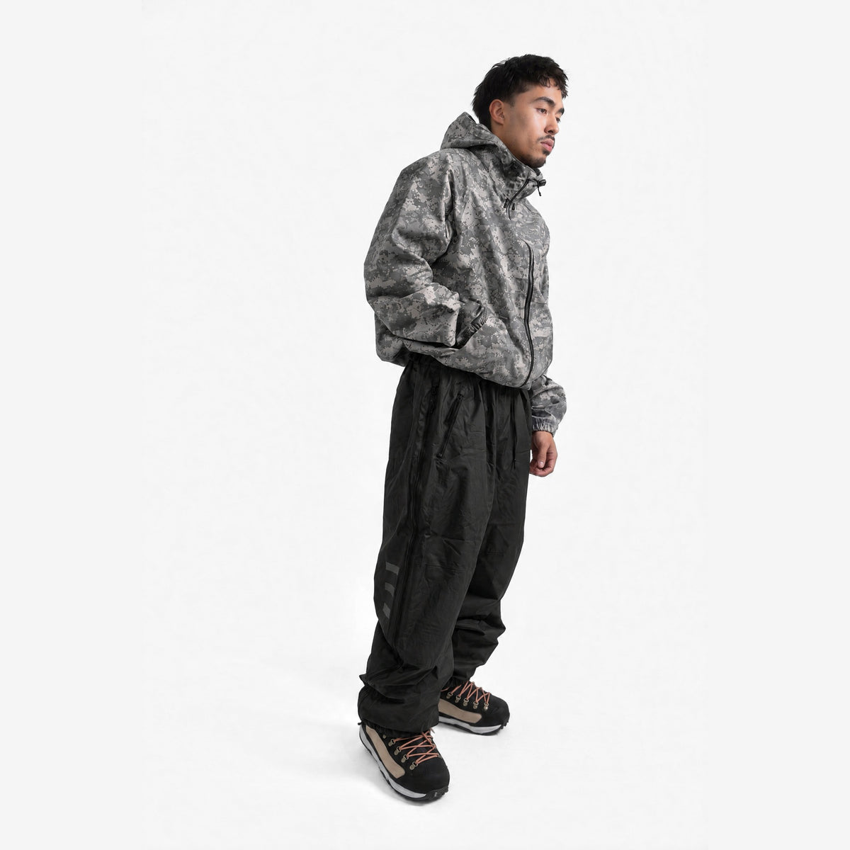 Endeavor 3L Scout Park Pant in Black, on model, another angle