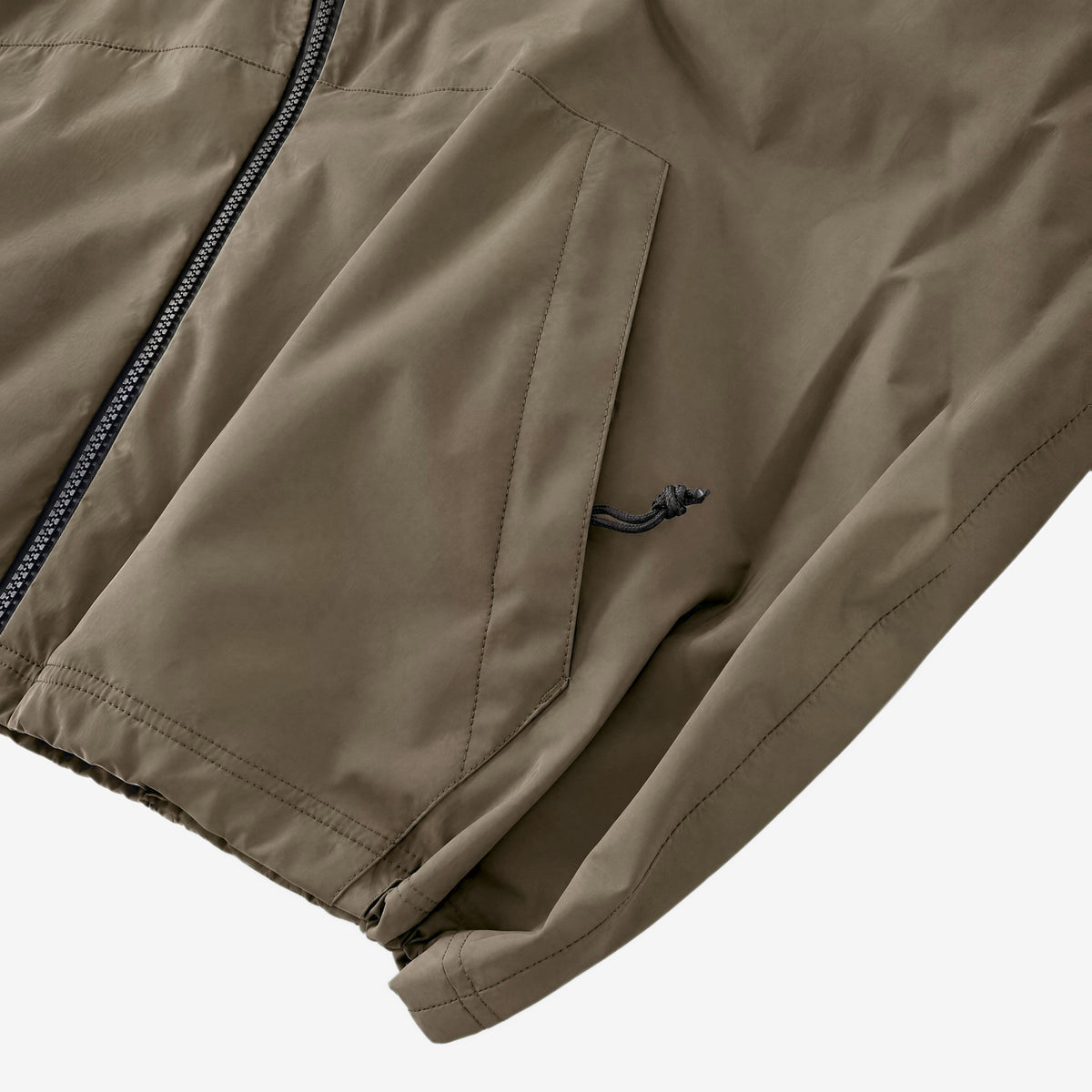 Endeavor 20K Windbreaker in Algae, zipped hand pocket with cord pull