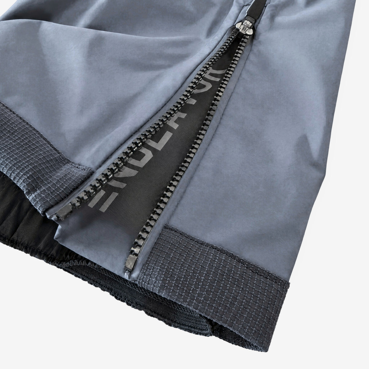 Endeavor 3L Shelter Bib Pant Graphite, boot zip hem detail