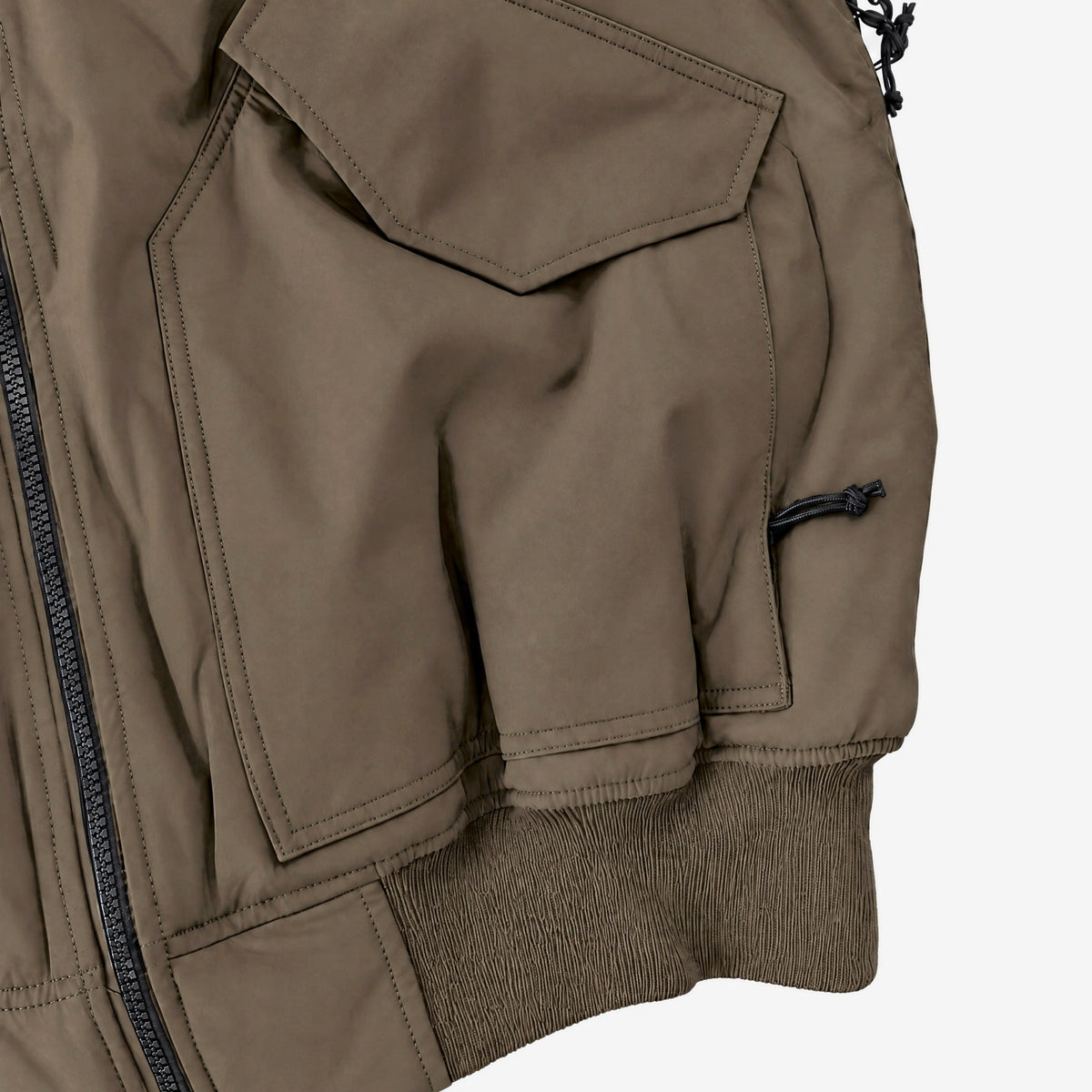 Endeavor 2L Bomber Jacket in Algae, lower flap pocket, hand pocket and rib-knit hem