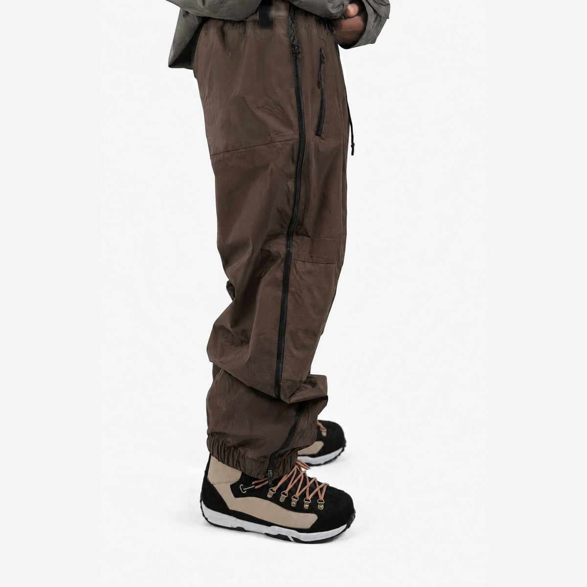 Endeavor 2L Ranger Pant in Chocolate, on model, leg close-up