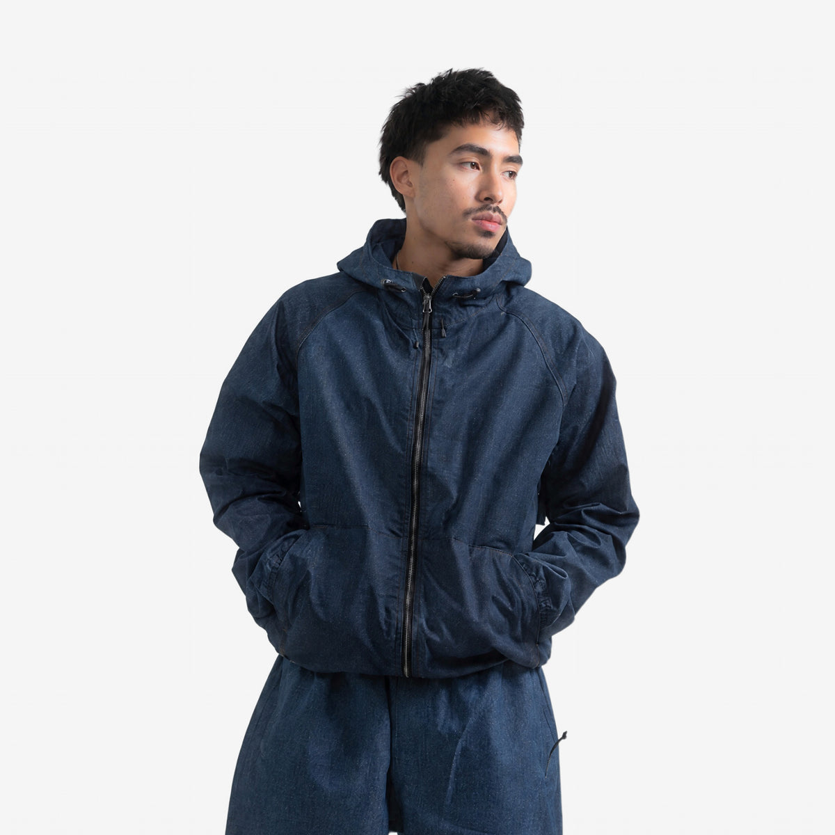 Endeavor 20K Windbreaker Limited Edition in Raw Denim, worn zipped, front view, with the matching Raw Denim Scout Park Pant