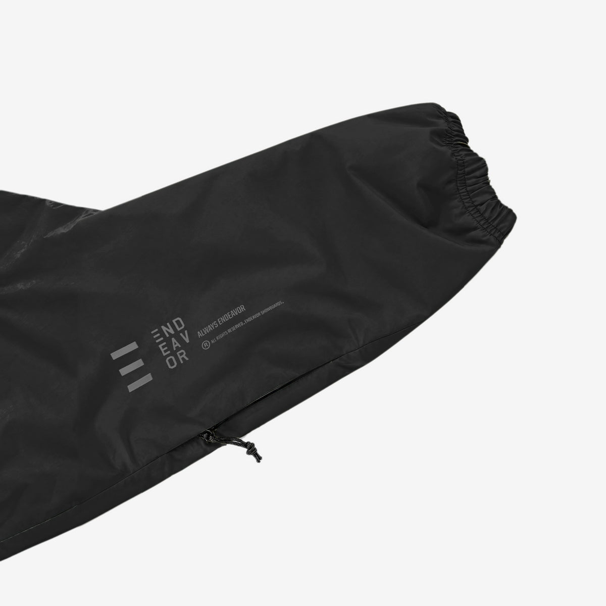 Endeavor 20K Windbreaker in Black, forearm print END/EAV/OR with ALWAYS ENDEAVOR and arm-pocket zip