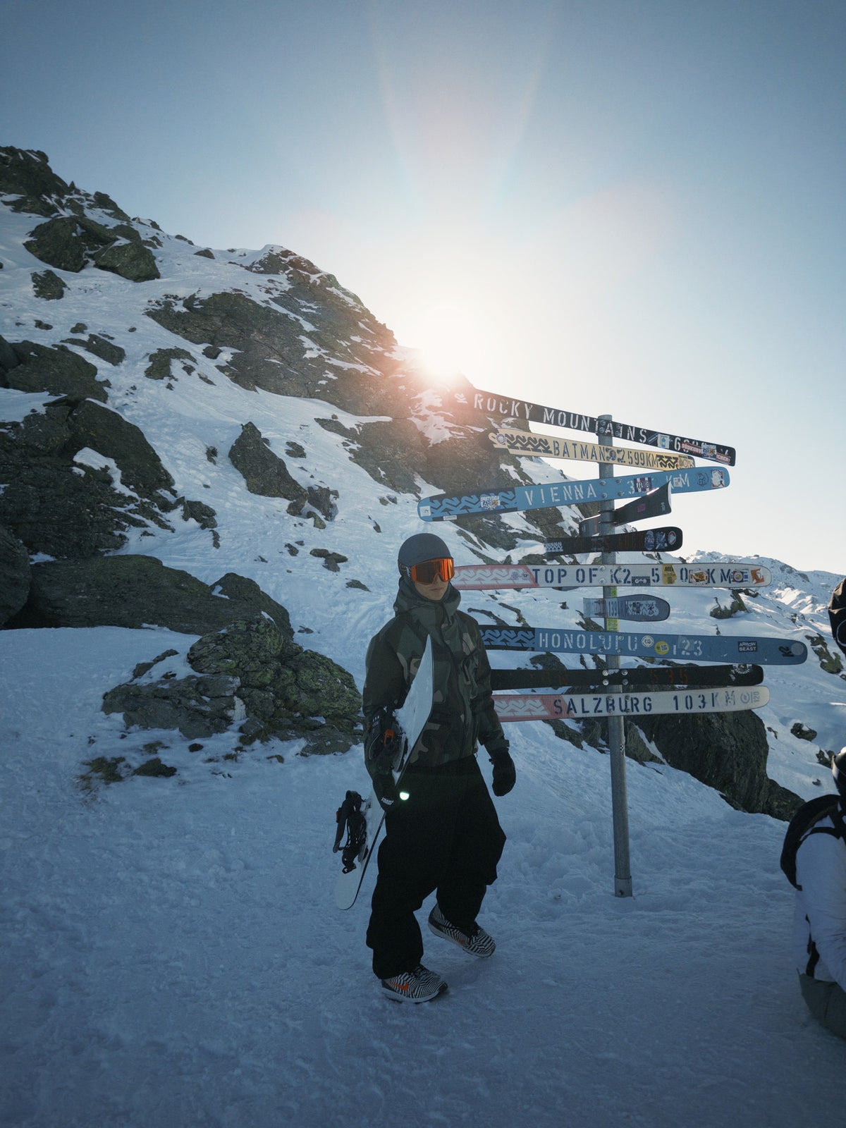 Rider with the Endeavor Rover at the summit signpost