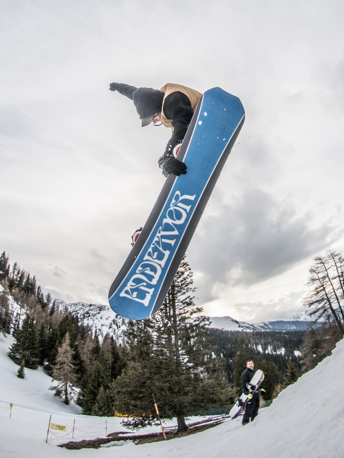 Endeavor Scout snowboard base in the air