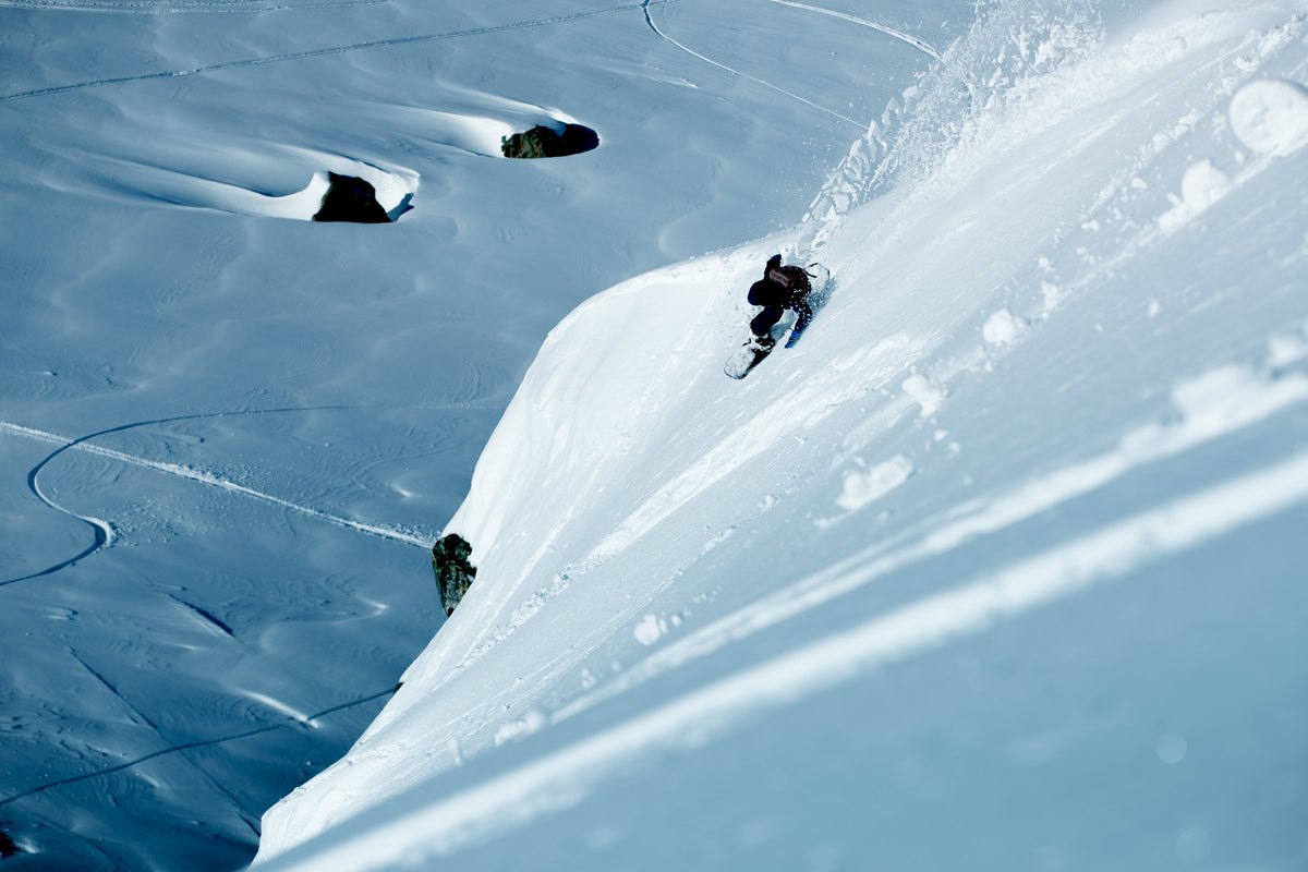 Backside slash in deep powder