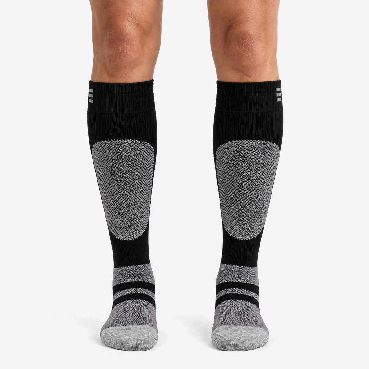 Endeavor Surplus Sock in black, worn, front view