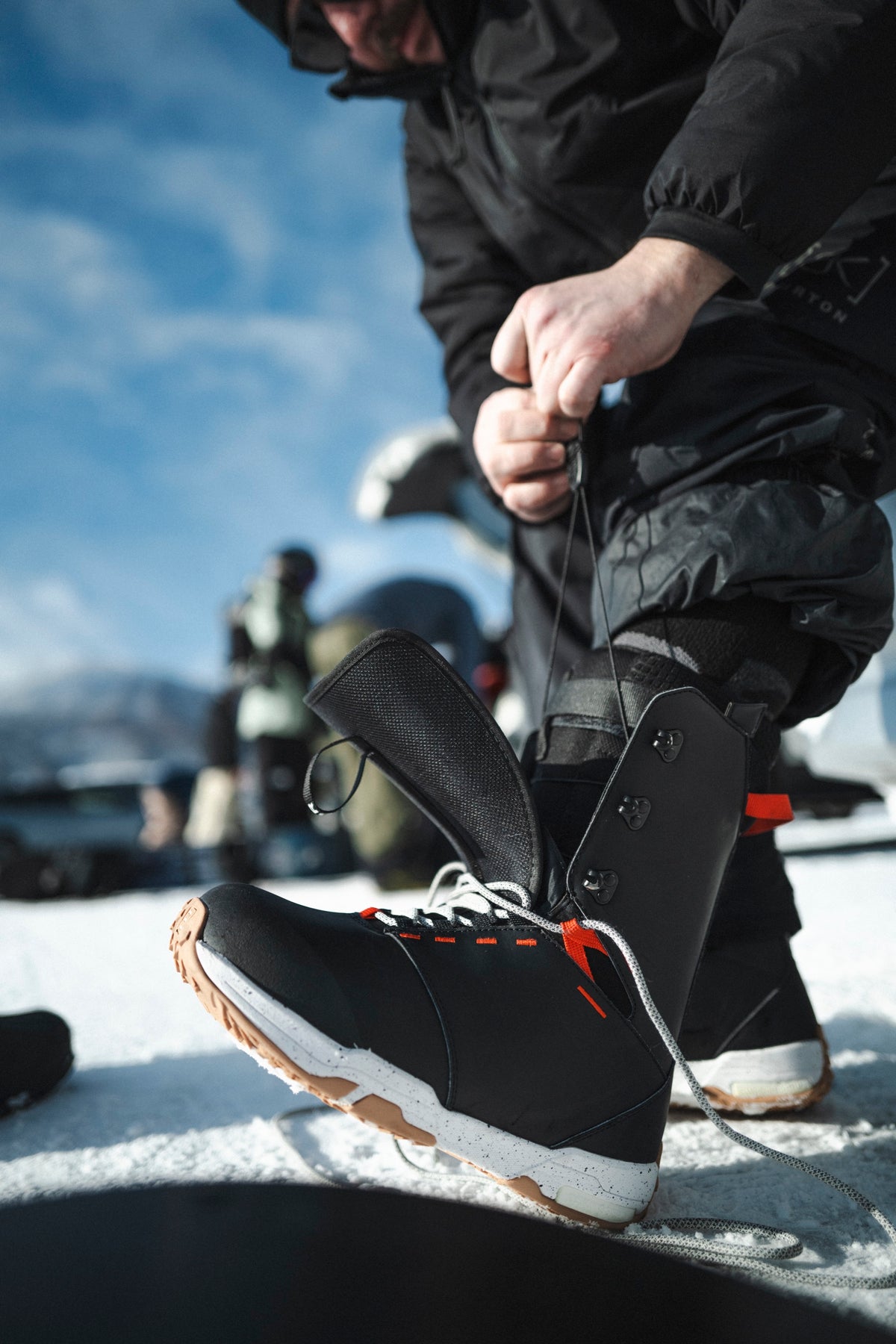 Pulling the quick-lace on the Scout Boot's heat mouldable liner