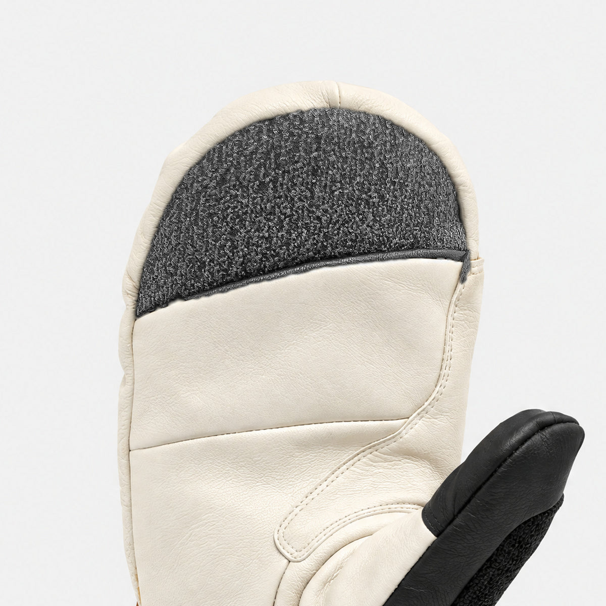 Carving Mitt Rust / Cloud, Kevlar-reinforced fingertip on the leather palm