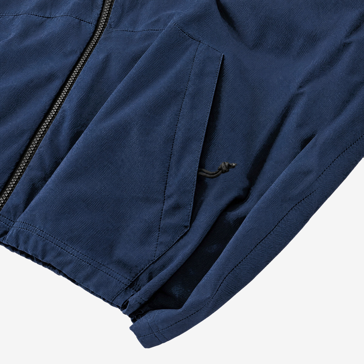 Endeavor 20K Windbreaker Limited Edition in Raw Denim, zipped hand pocket with cord pull