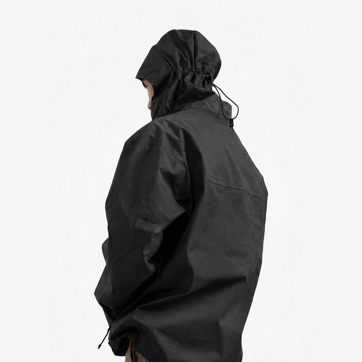 Endeavor 3L Shelter Jacket in Black, on model, waist-up