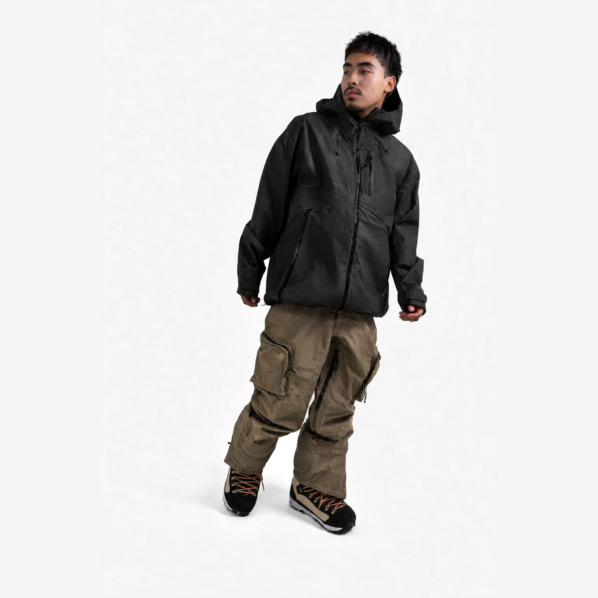 Endeavor 3L Shelter Jacket in Black, on model, another angle