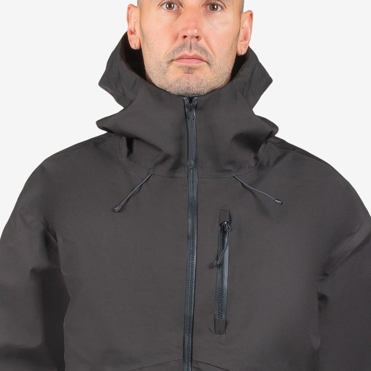 Endeavor 3L Shelter Jacket collar and hood detail — sealed seams and waterproof zipper