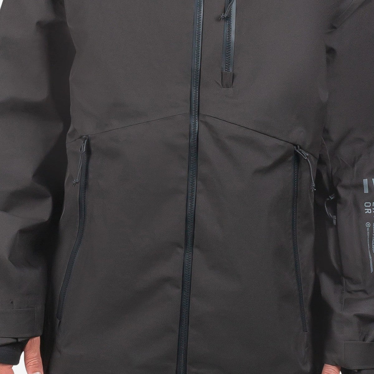 Endeavor 3L Shelter Jacket lower shell detail — waterproof zips and hand pockets